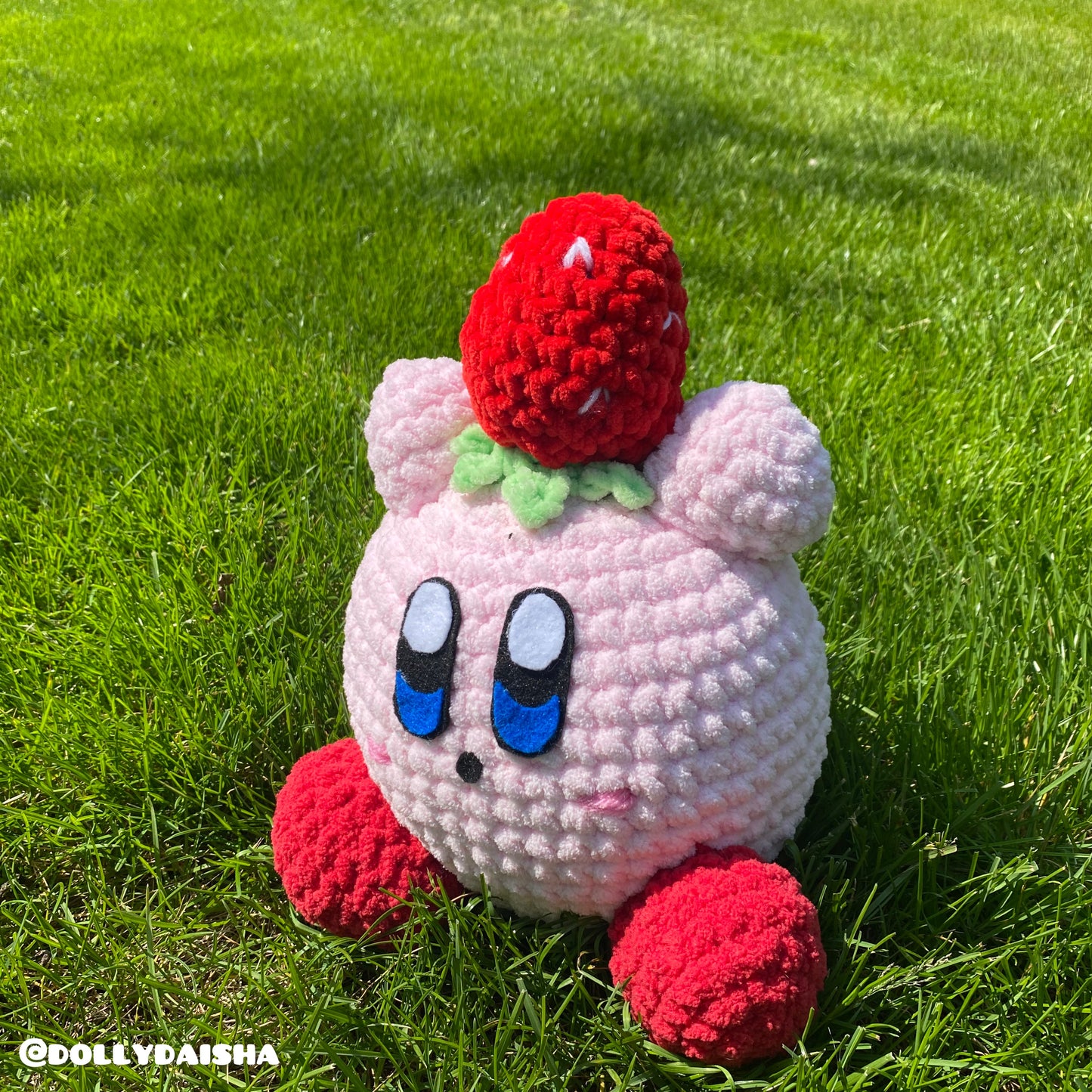 Pink Puff holding a strawberry plushie 12in